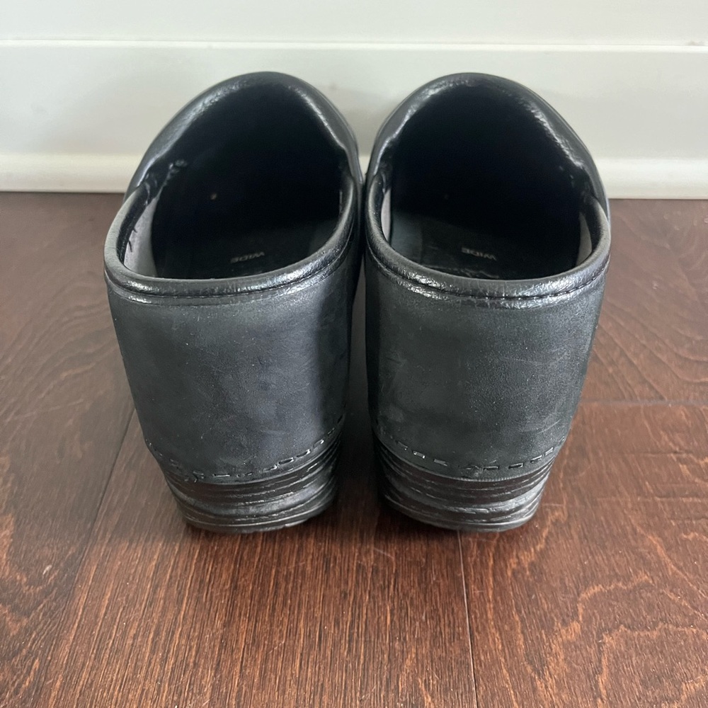 Dansko 38 wide.  Black in color.  Gently loved.